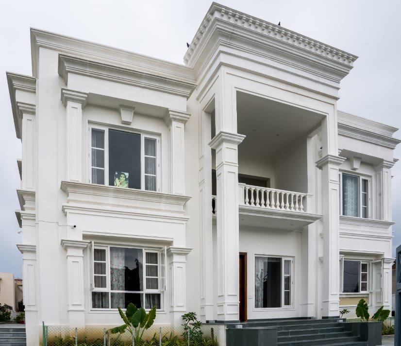 Front View of Chez Lavania boutique hotel Udaipur — king bed with Aravali hill view
